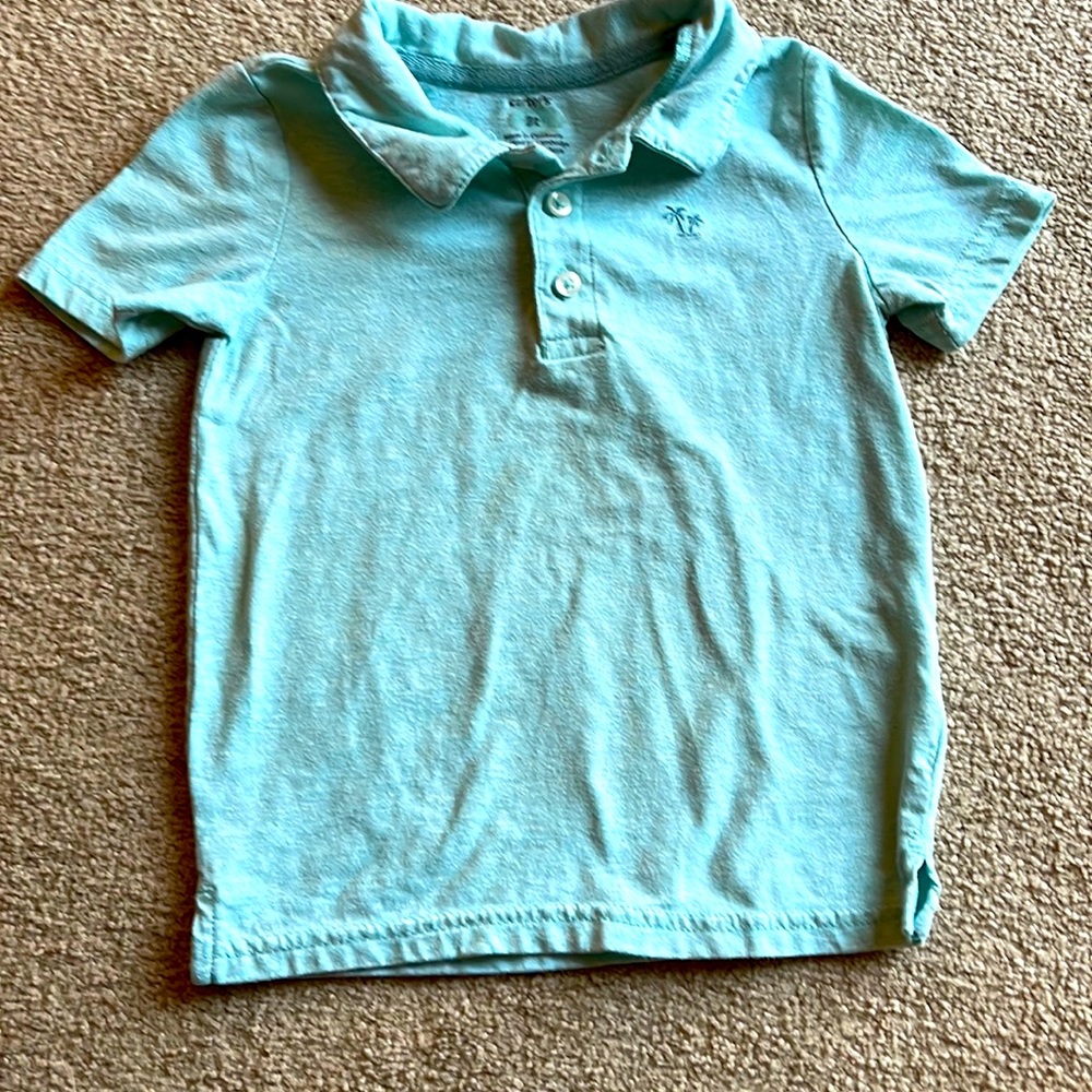 Adorable teal polo